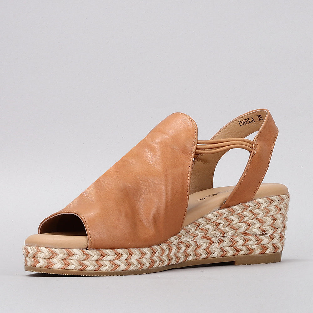 Le Sansa Darla tan sandals with open toe design and ankle strap, featuring a sleek and stylish tan leather finish.