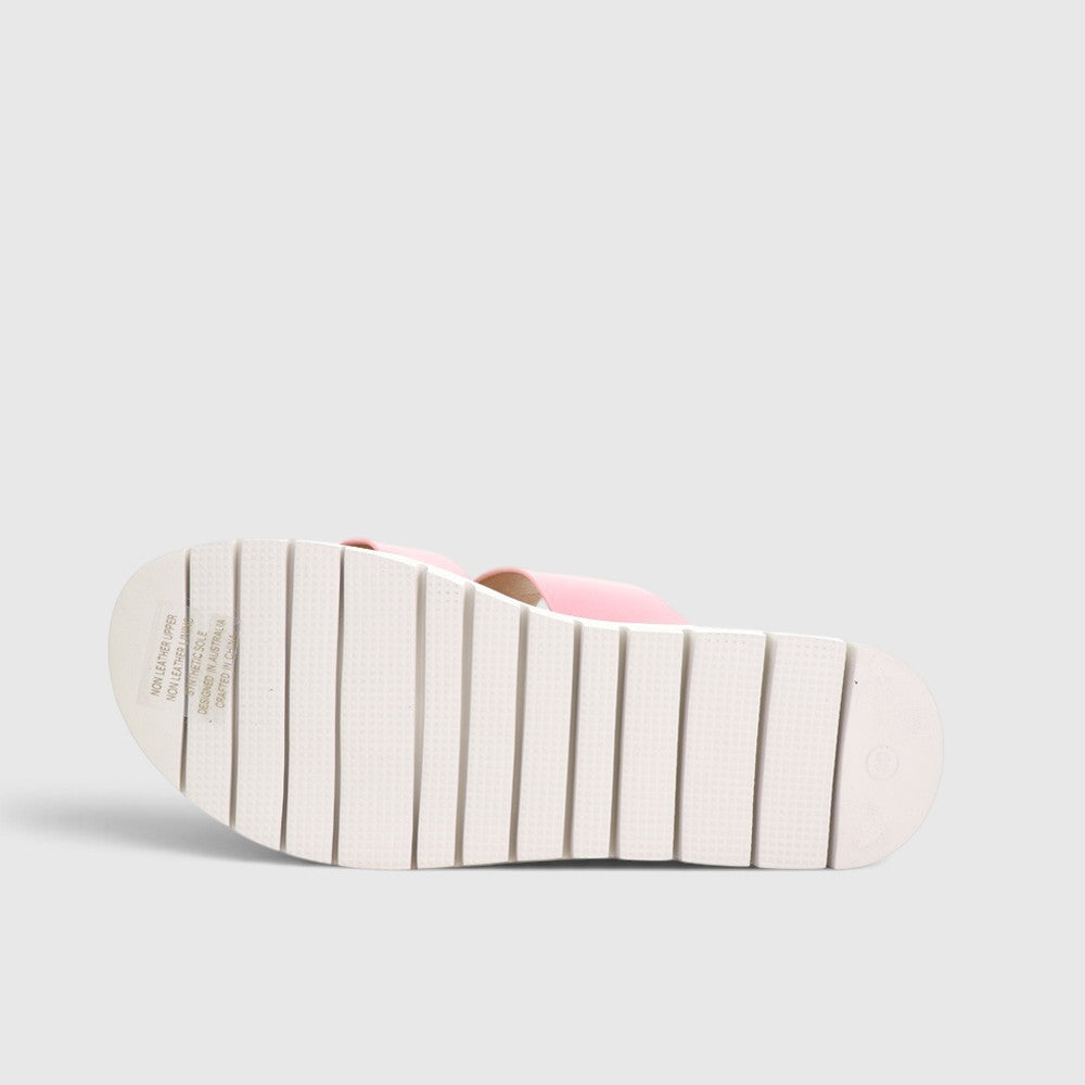 CC Resorts Domino baby pink slip-on shoes for kids, featuring a soft fabric upper and comfortable fit.