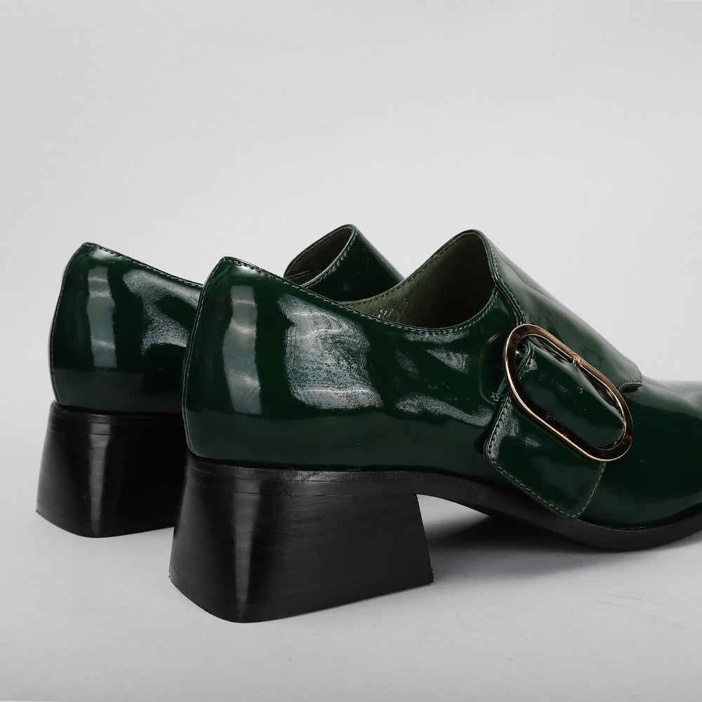 Le Sansa Rice Bottle Green loafers featuring sleek design and green leather material, perfect for casual or formal wear.