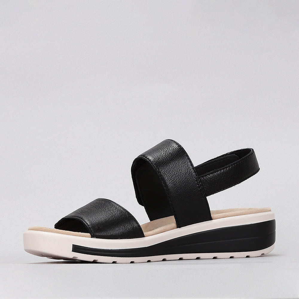 Naked Arches Hanza black sandals with open-toe design, adjustable straps, and cushioned footbed for comfortable wear.