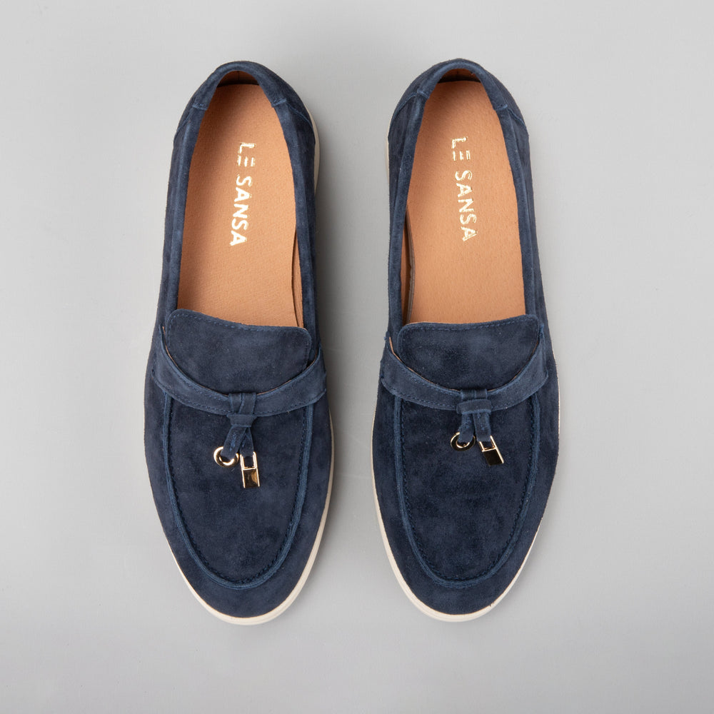 Le Sansa Capri Navy Suede Loafers with a classic slip-on design and sleek navy blue finish.