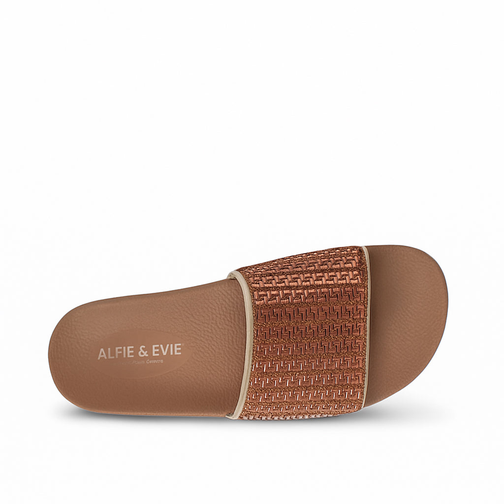 ALFIE & EVIE Billie nude slip-on shoes with a sleek design and neutral color, perfect for casual and stylish looks.
