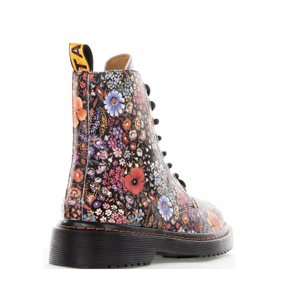 Black Le Sansa Sansa Depth boots featuring a stylish floral design, showcasing the sleek and modern footwear style.
