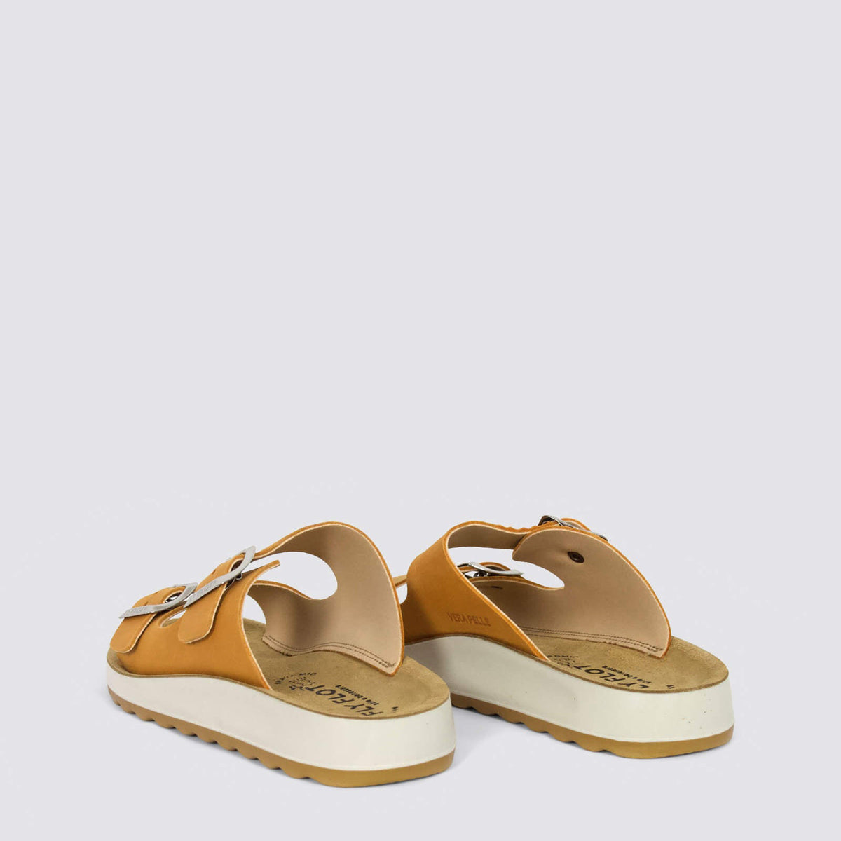 Fly Flot flats in vibrant orange with slip-on design, lightweight and comfortable for everyday wear.