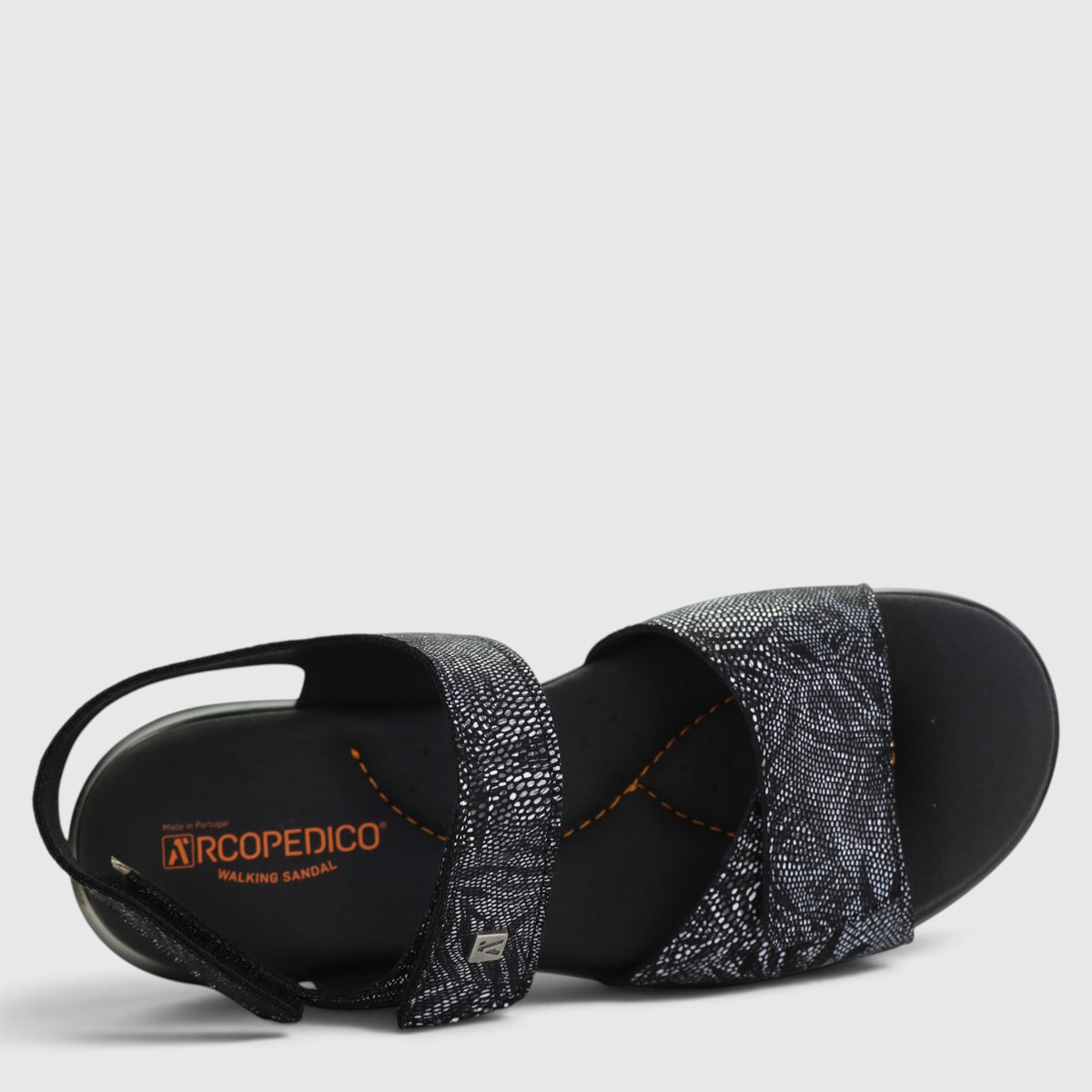 Black Arcopedico Corbett sandals with adjustable straps and cushioned footbed, designed for comfortable casual wear.