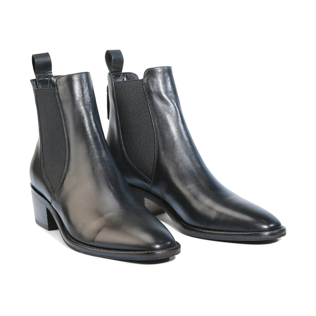 Eos Ila Black boots with sleek leather design, rounded toes, and ankle-high style, perfect for casual or dressy outfits.