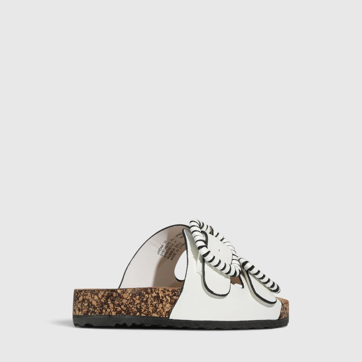 White Los Cabos Jirona slippers with plush fabric, open-toe design, and cushioned sole for comfortable indoor wear.