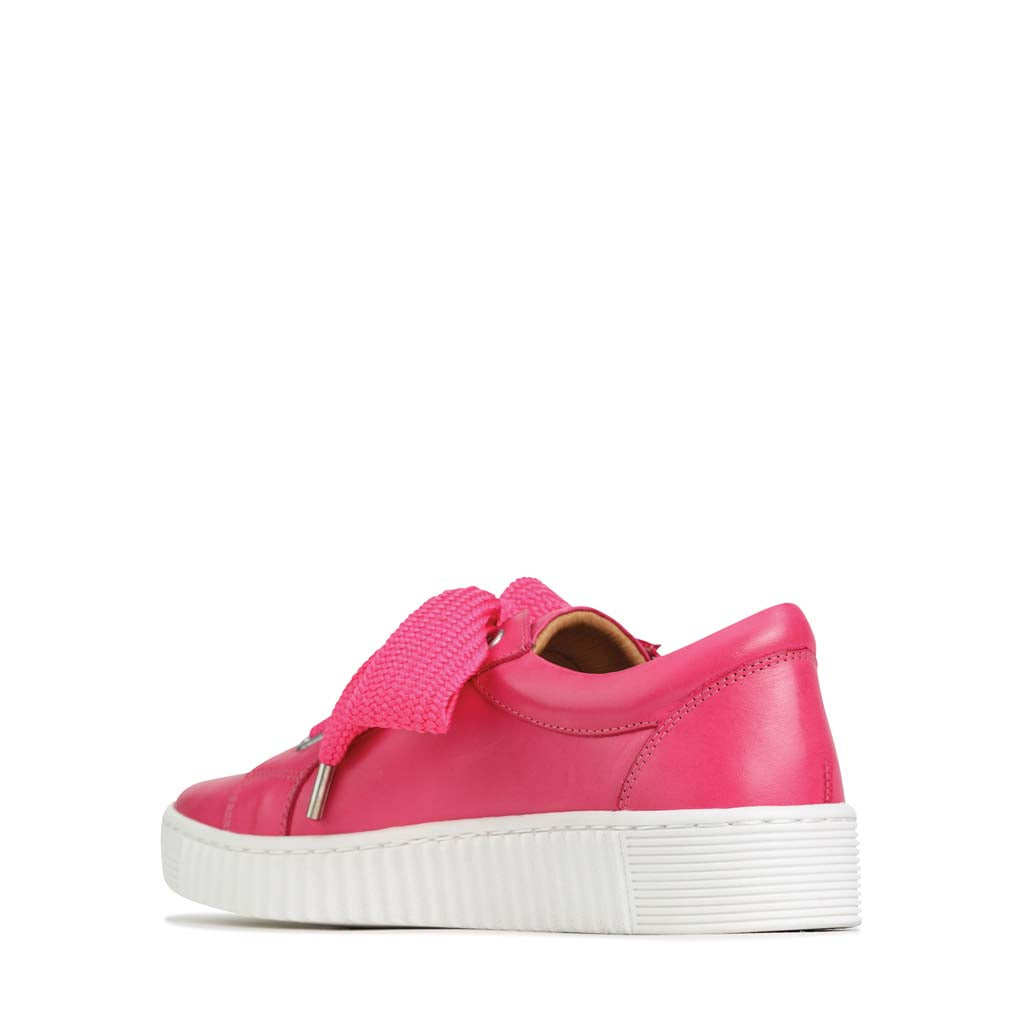 Eos Jovi Fuchsia sneakers with vibrant pink color, featuring comfortable inside view and stylish design.