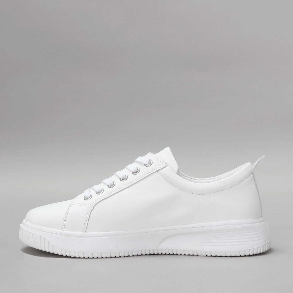 Naked Arches Nelly White sneakers with clean white design and casual laces, shown from a front view.