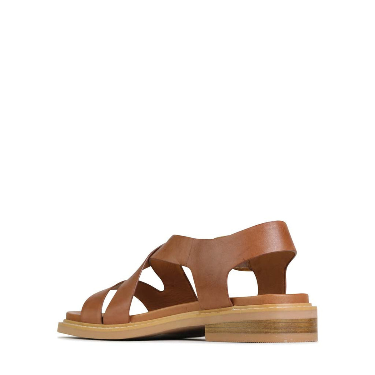 Eos Brandy sandals with stylish ornament details, displayed inside with open-toe design and comfortable straps.