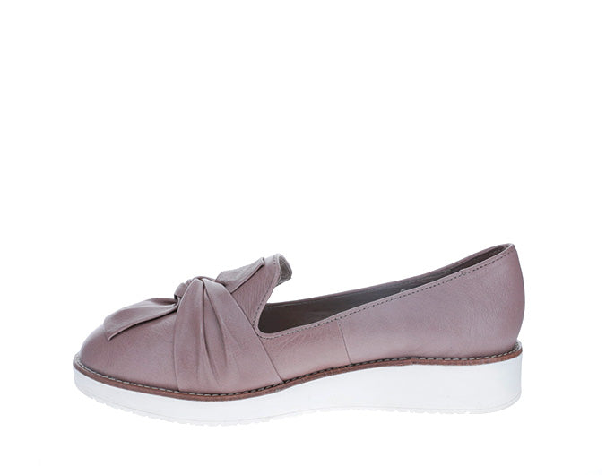Le Sansa Lesansa Rosie taupe slip-on shoes with a sleek design and comfortable fit, shown from a side view.