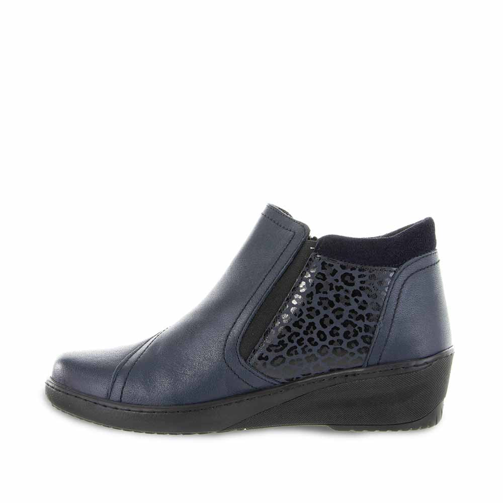 Navy Cabello CP462-18 boots with ankle-length design and sturdy sole, featuring stylish laces and a sleek, casual look.