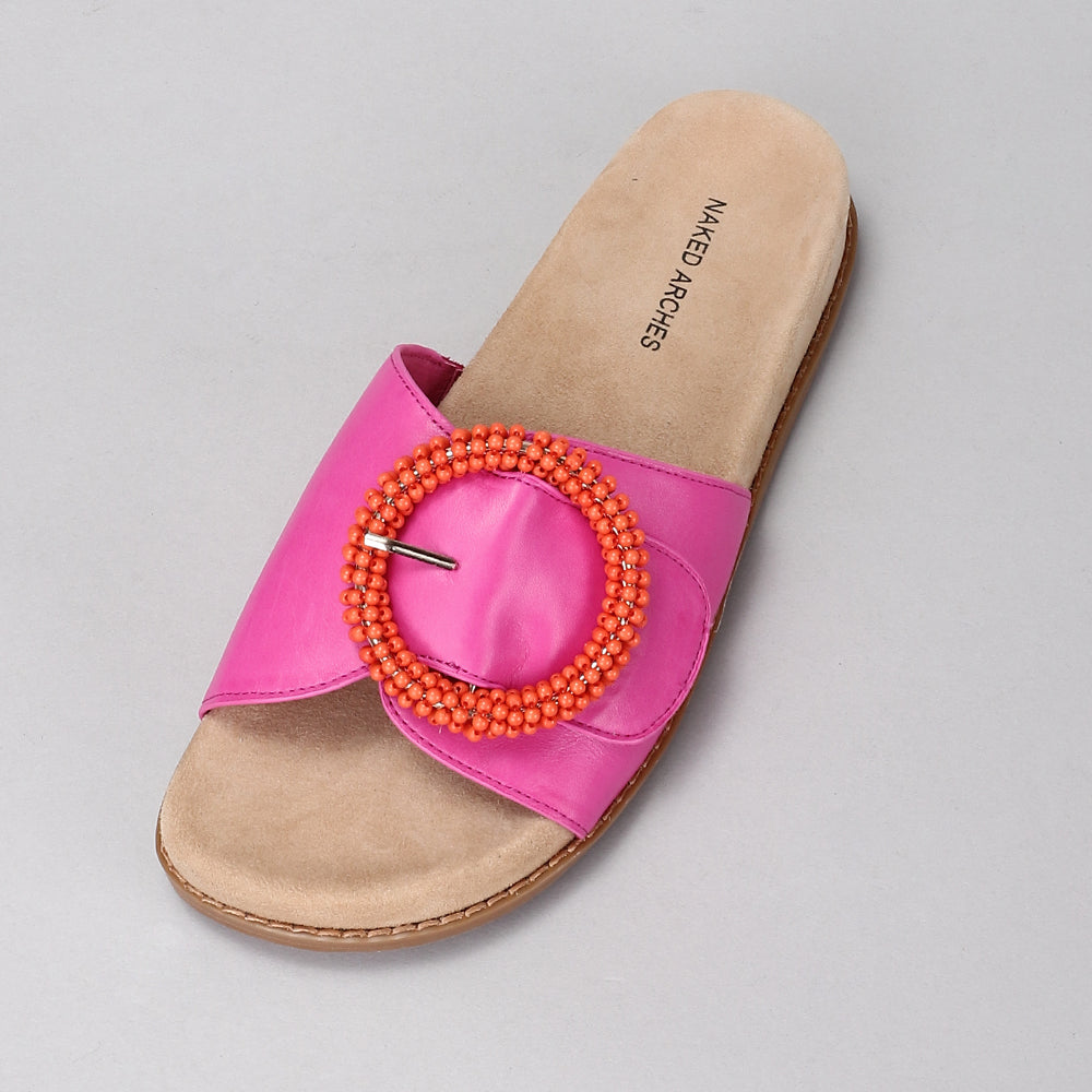 Naked Arches Zoya Hot Pink slip-on shoes with vibrant pink color and sleek design, displayed on a white background.