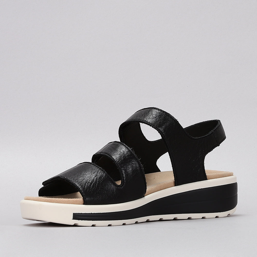 NAKED ARCHES Holiday Black sandals with sleek black straps and cushioned footbed, stylish and comfortable for warm weather.