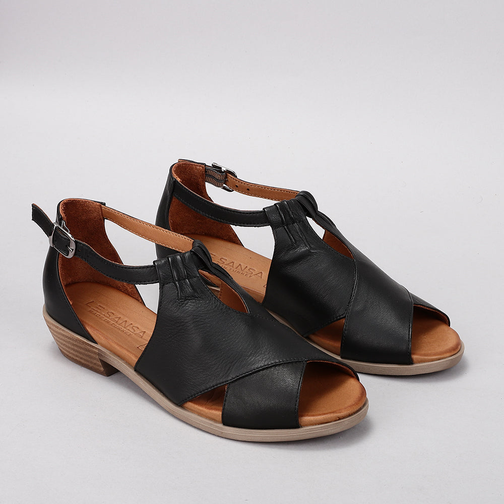 Le Sansa Digby black sandals with ankle straps and open toe design, perfect for casual summer wear.