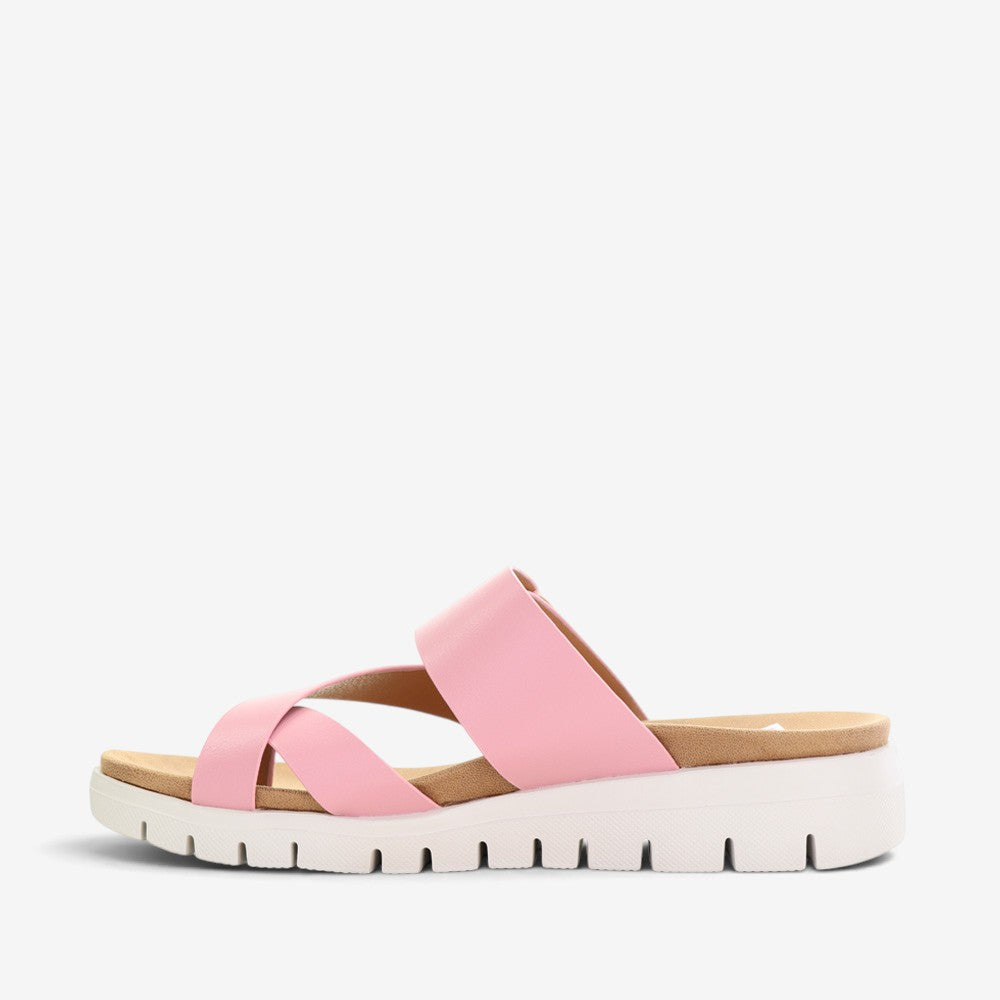 CC Resorts Domino baby pink slip-on shoes for girls with a comfortable, casual design and soft fabric material.