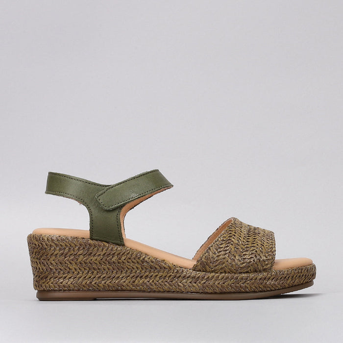 Le Sansa Pilia Khaki sandals featuring open-toe design and ankle straps, suitable for casual summer wear.