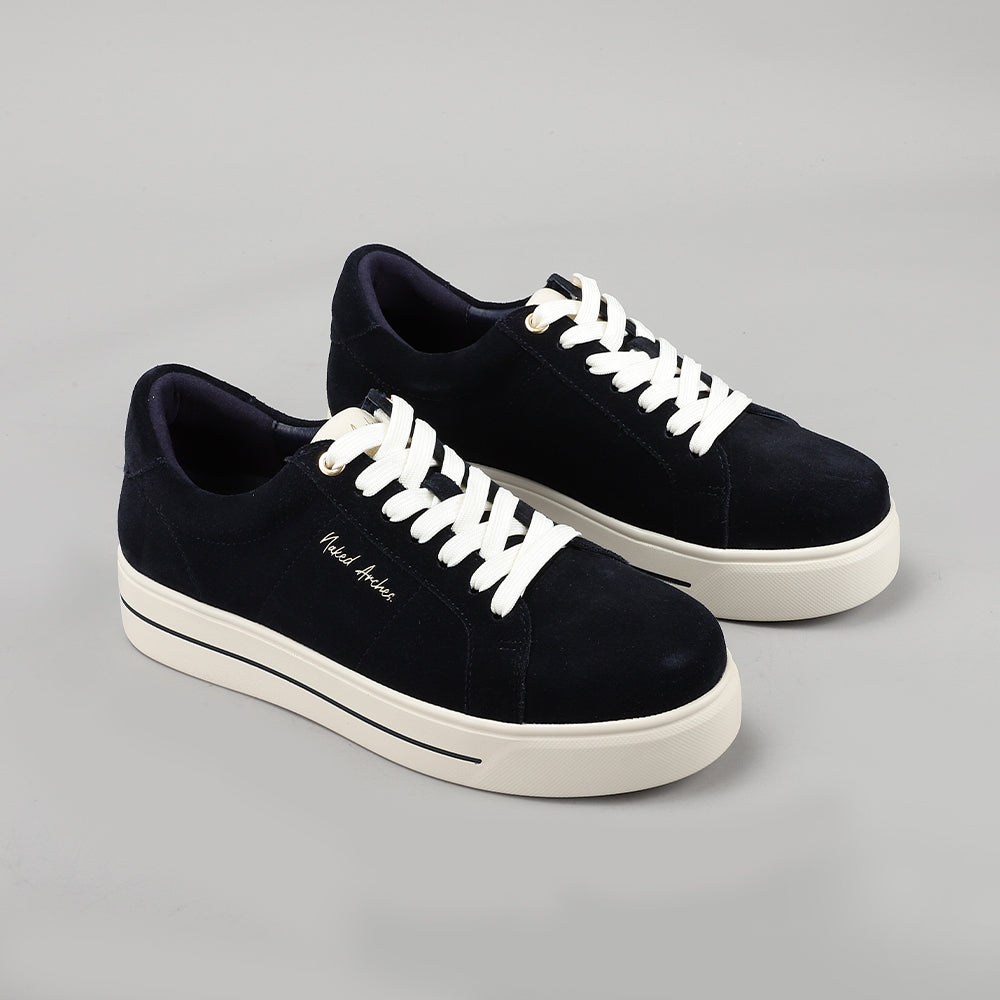 Naked Arches Azealia navy sneakers with white sole, stylish athletic design, and navy fabric upper for casual wear.