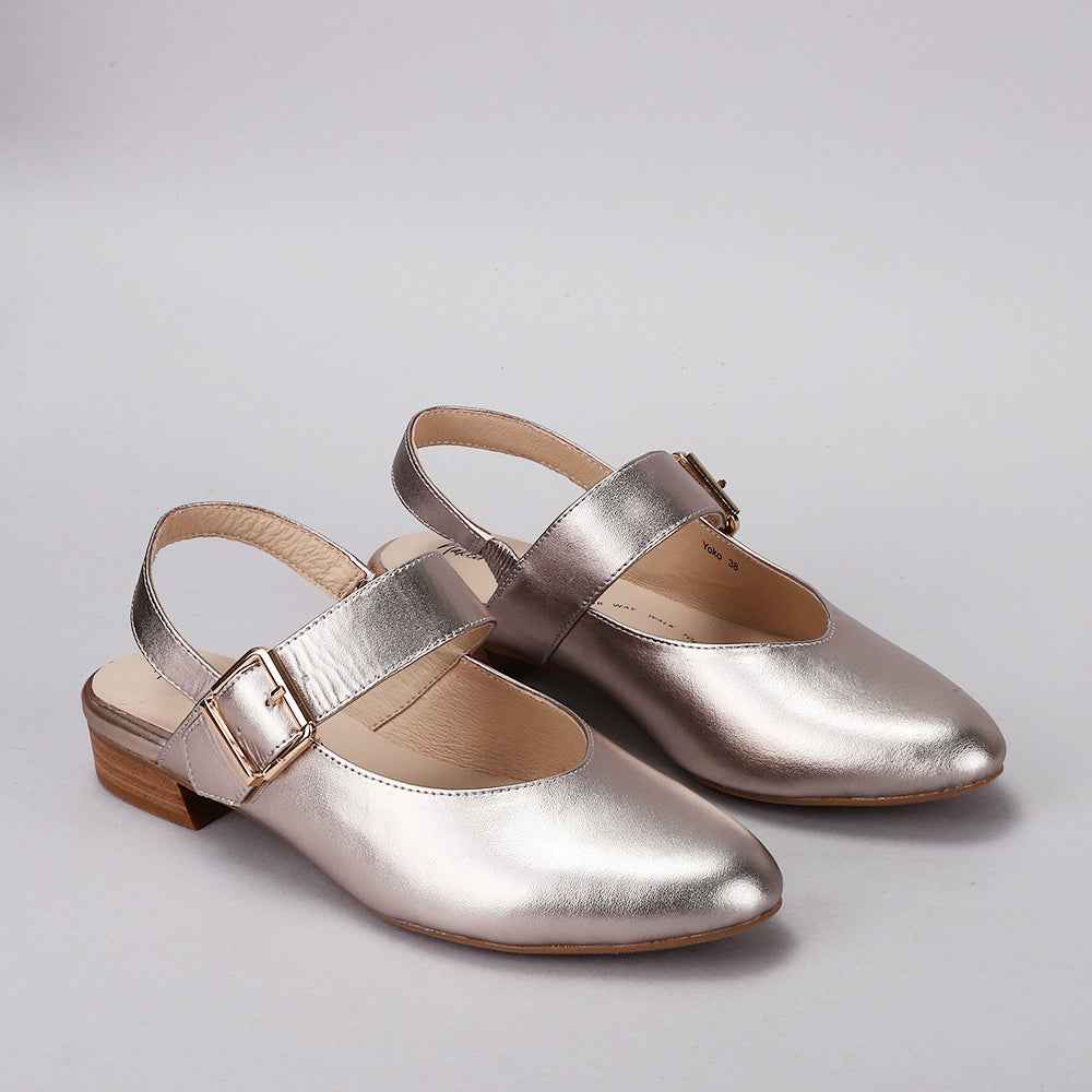 Naked Arches Yoko Champagne sandals with strappy design and cushioned footbed, stylish and comfortable for casual wear.