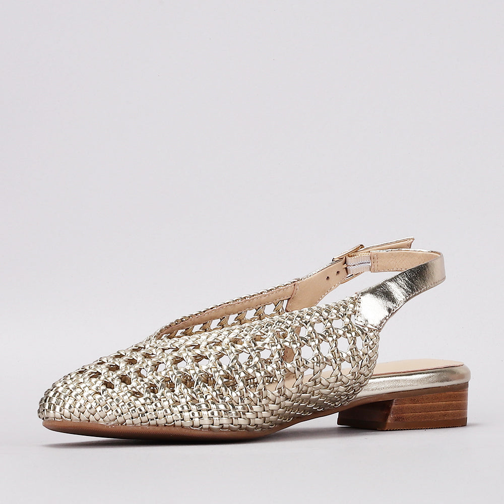Le Sansa Camila light gold sandals with open toes and ankle straps, stylish footwear for casual or dressy occasions.