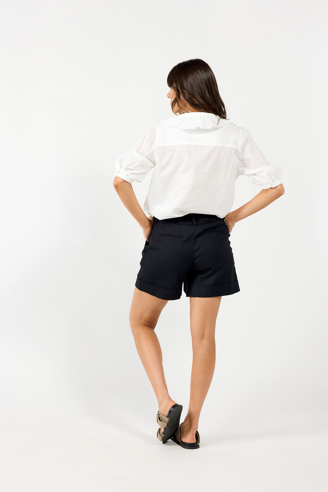White "Taken" blouse by Drama The Label, showcasing a stylish, lightweight top with a relaxed fit and elegant design.