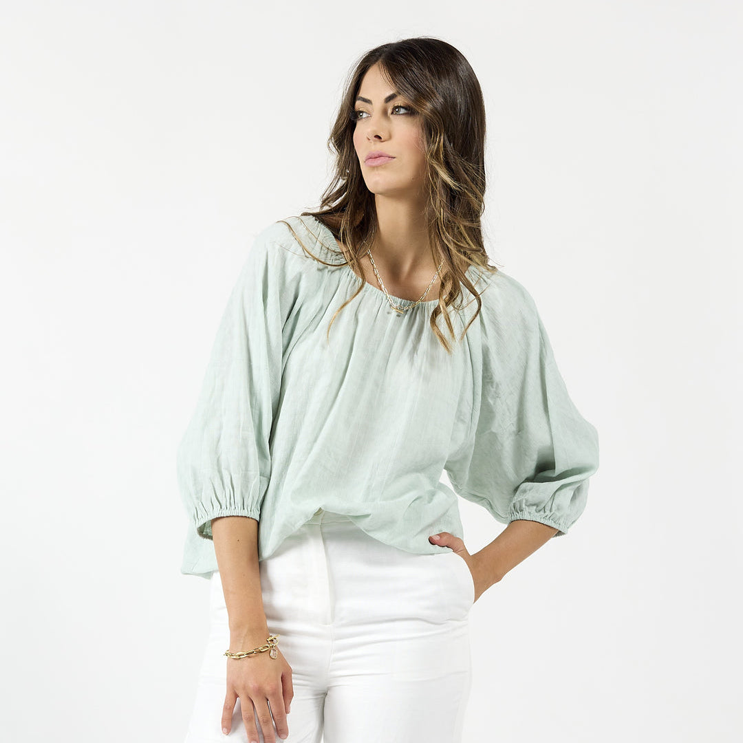 Mint green Drama The Label Milos top, a stylish sleeveless blouse with a relaxed fit and subtle neckline detail.