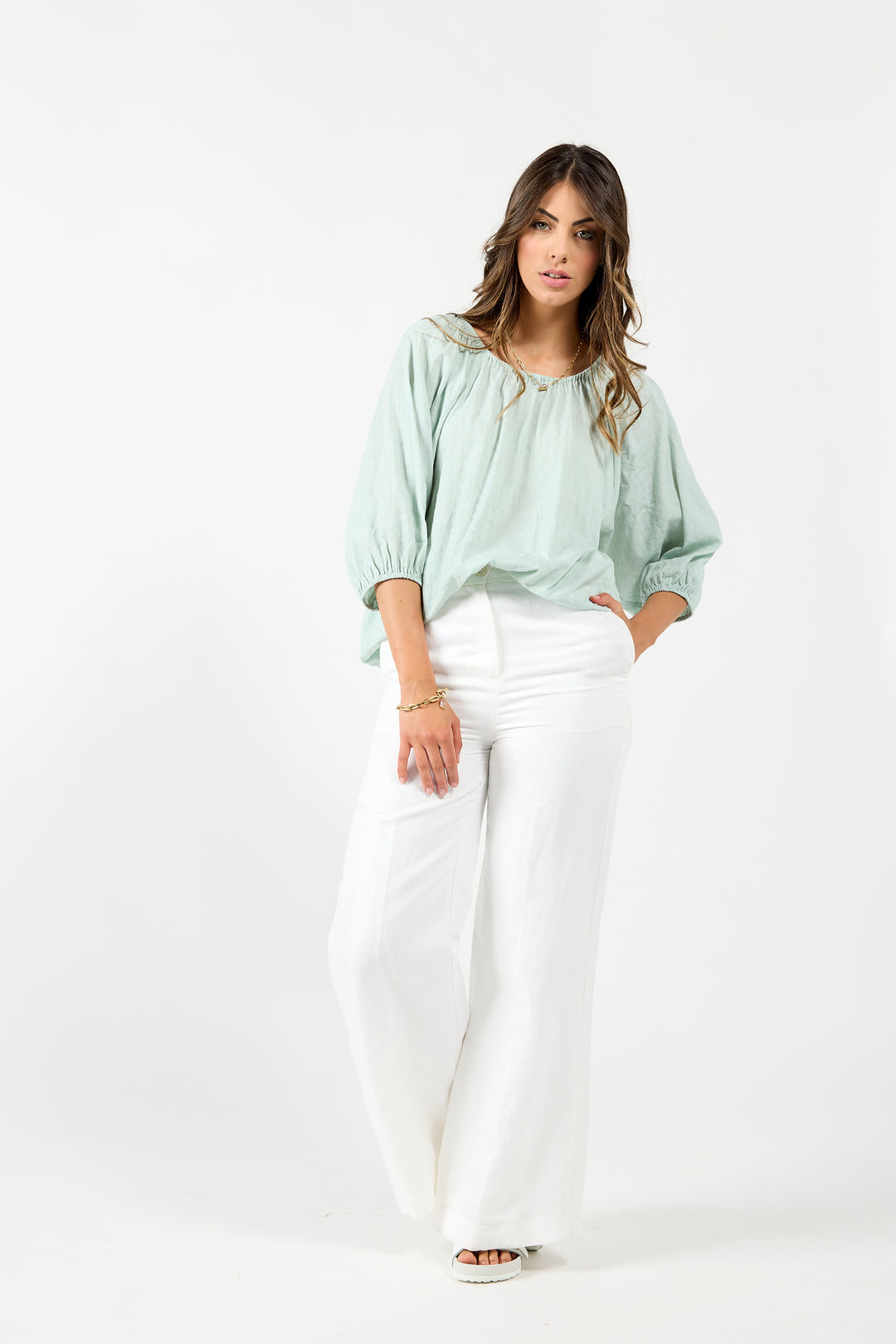 Mint green Drama The Label Milos top, a stylish sleeveless blouse with a relaxed fit, perfect for casual or dressy occasions.
