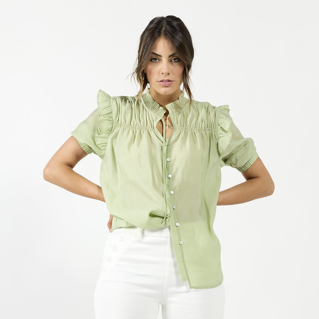 Drama The Label Bianca blouse in seedling color, off-white cami top with delicate fabric and sleeveless design.