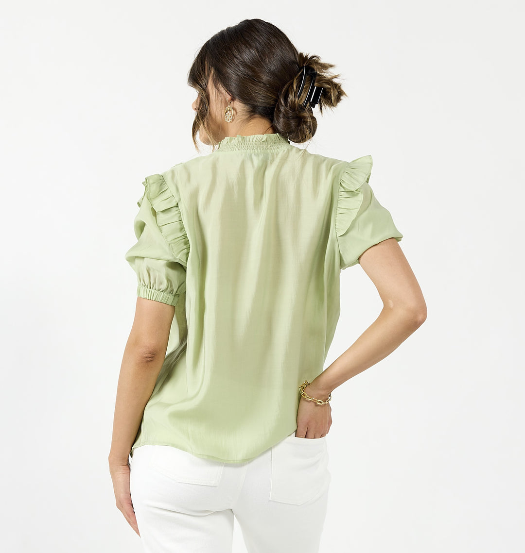 Drama The Label Bianca blouse in off-white, sleeveless top with a seedling print, perfect for casual or stylish wear.