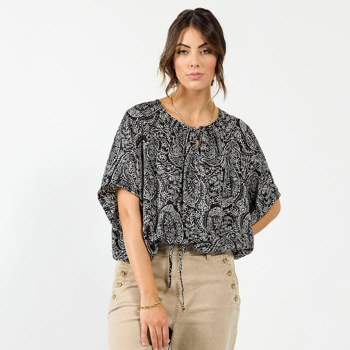 Drama The Label Liberty Top in black paisley print, featuring a stylish blouse with a flowy design and sleeveless cami style.