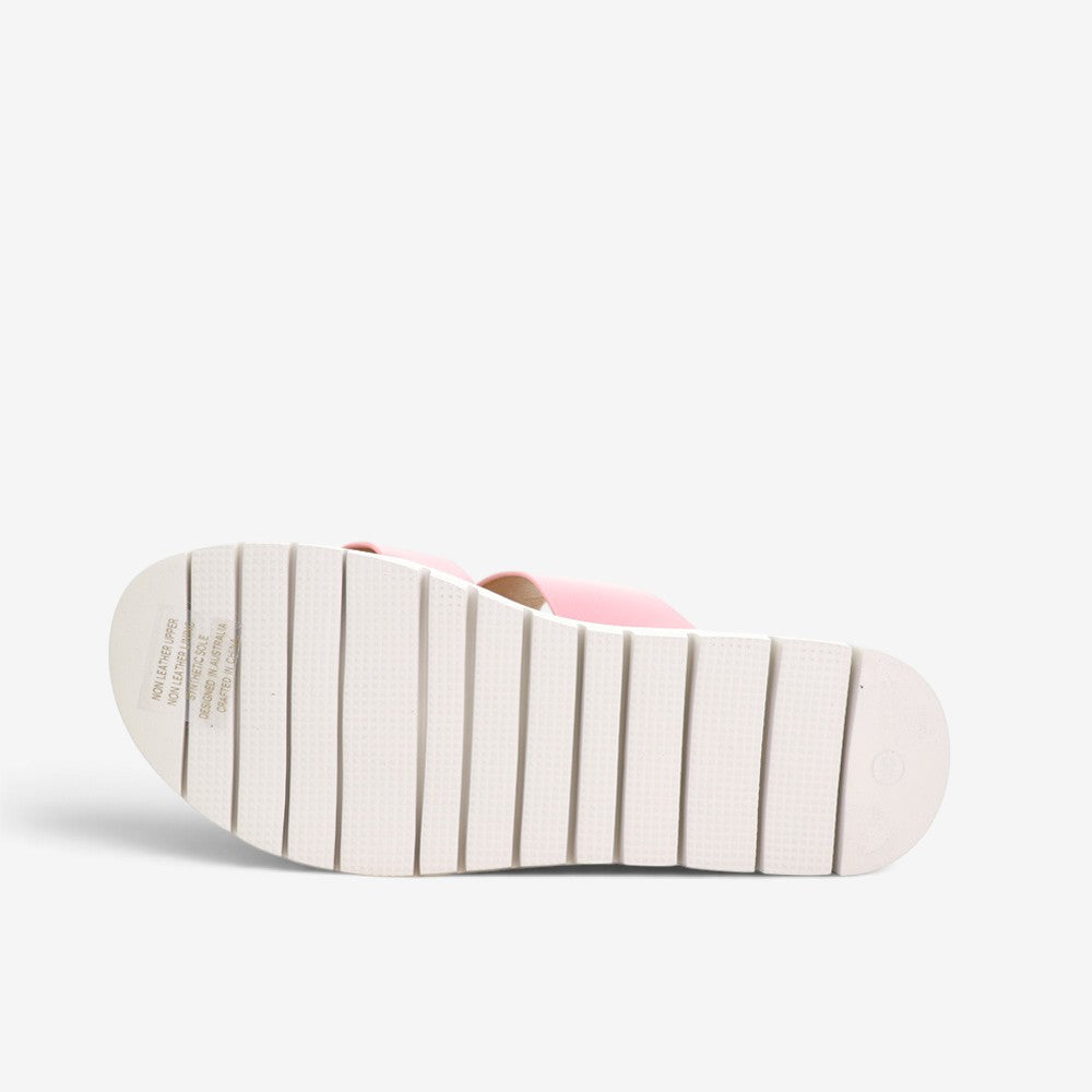 CC Resorts Domino baby pink slip-on shoes for kids, featuring a soft fabric upper and comfortable design.