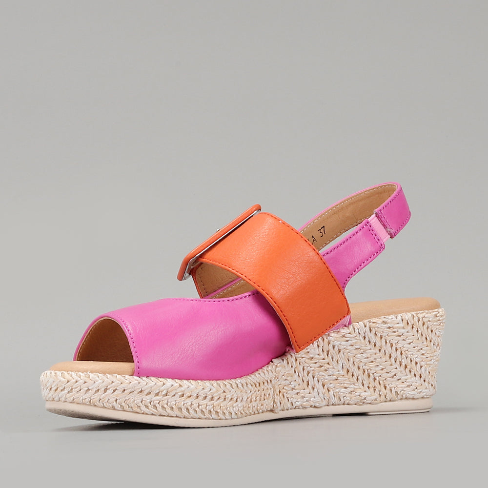 Le Sansa Fuchsia Orange sandals with open toe and ankle strap, featuring stylish design and vibrant color for casual wear.