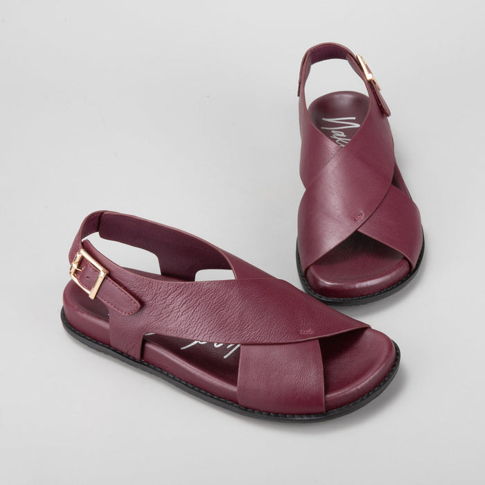 Naked Arches Zigilia Merlot sandals with open toe design and slip-on style, featuring a deep red Merlot color and comfortable arch support.