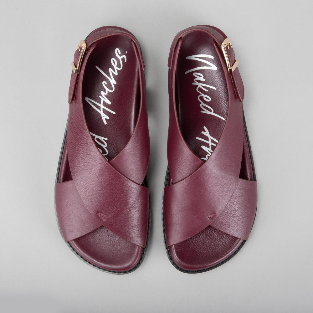 Naked Arches Zigilia Merlot sandals with burgundy straps and cushioned footbed, showcasing stylish and comfortable footwear.