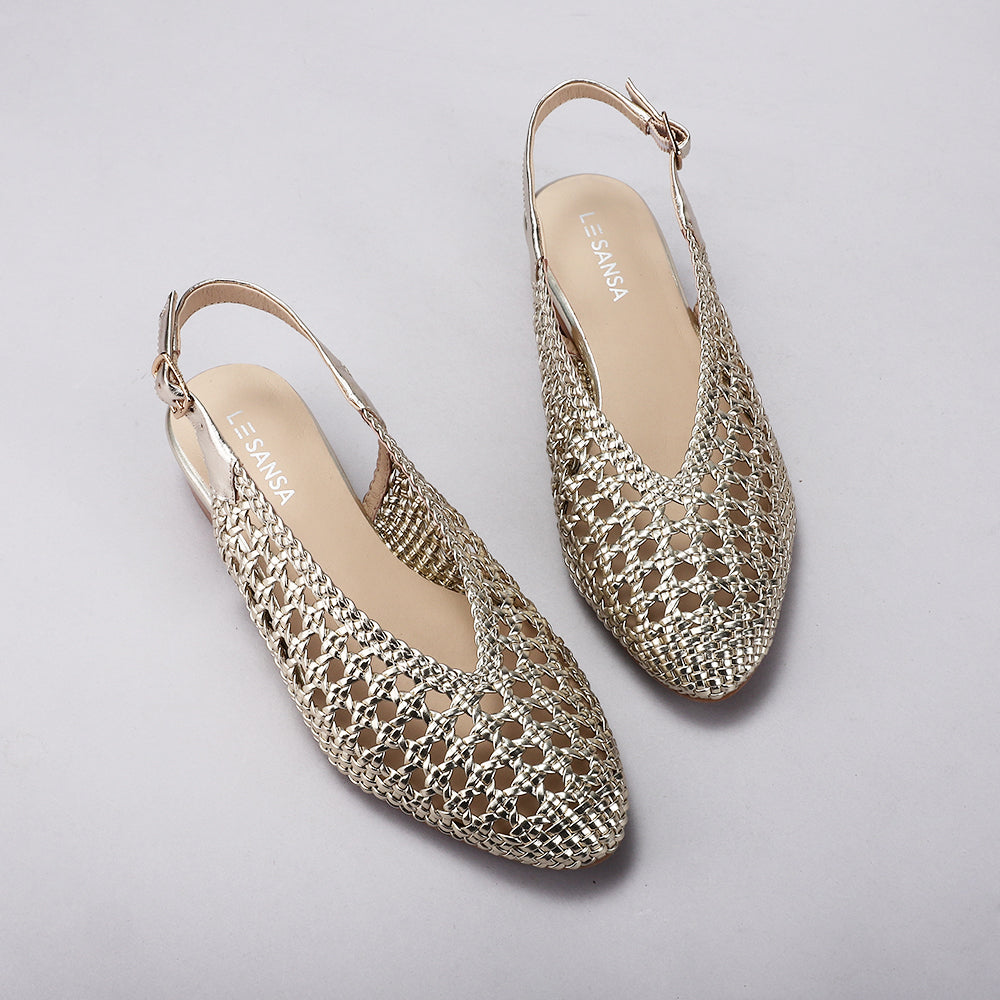 Le Sansa Camila light gold sandals with open toe design and ankle straps, stylish footwear for warm weather.
