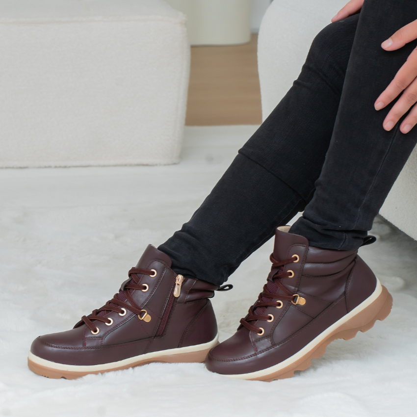 CC Resorts Gambian Bordo boots featuring stylish ankle-length design with rich burgundy color and detailed stitching.
