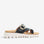 Black slip-on shoes from CC Resorts with a sleek, minimalist design suitable for casual and resort wear.