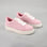 Pink NAKED ARCHES AZEALIA baby pink sneakers with white soles and minimalistic design, perfect for casual wear.