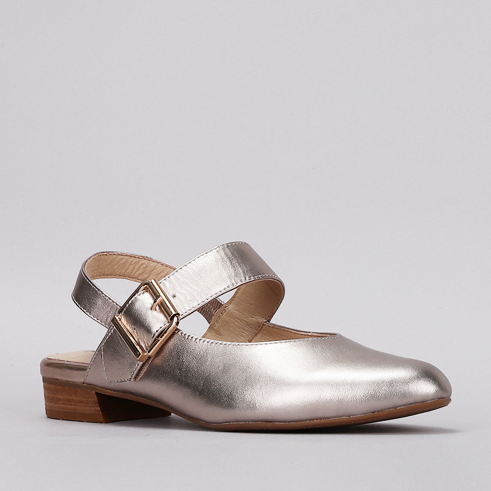 Naked Arches Yoko Champagne sandals with beige straps and open toe design, featuring a cushioned footbed and flat sole.