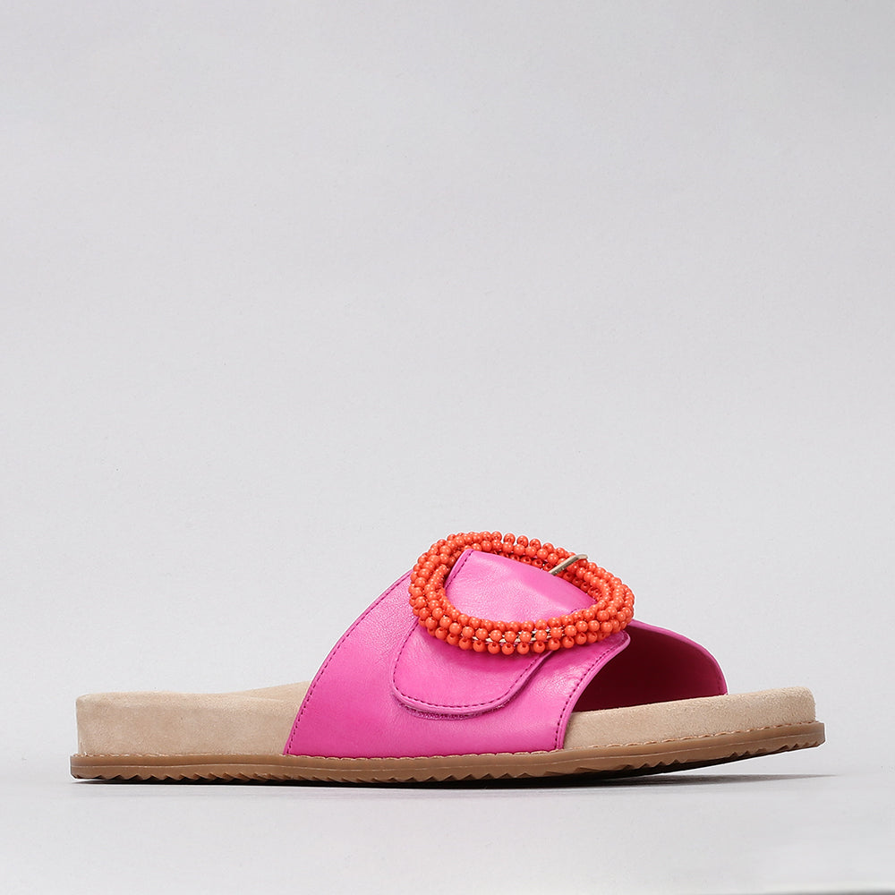 Naked Arches Zoya hot pink slip-on shoes with a sleek design and comfortable fit.