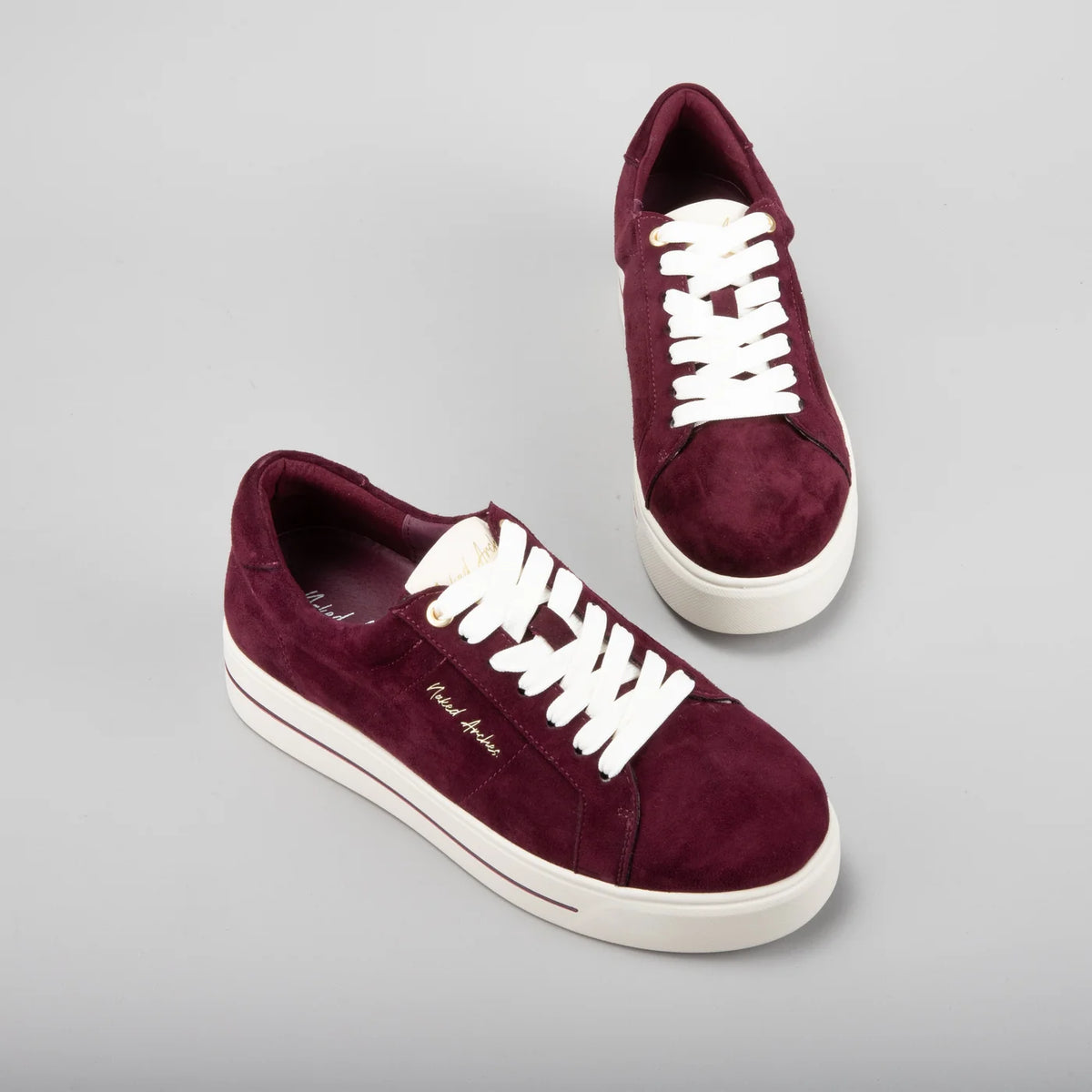 Naked Arches Azealia Burgundy sneakers with burgundy and white design, showcasing stylish casual sneakers with laces.