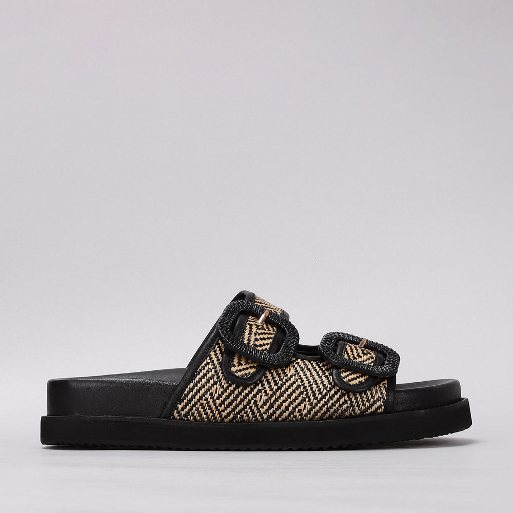 Black Naked Arches Harriet flats featuring a sleek, minimalist design with a rounded toe and comfortable slip-on style.