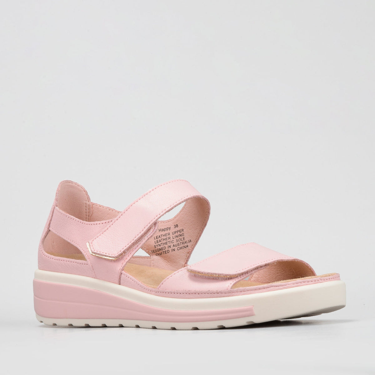 Naked Arches Happy Baby Pink sandals for toddlers, featuring soft pink straps and cushioned soles for comfortable wear.