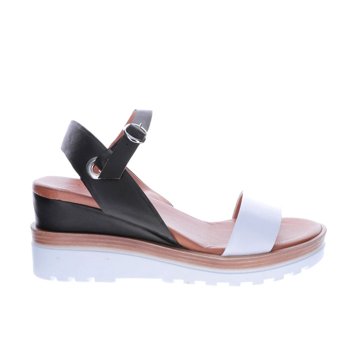 Le Sansa Lesansa Taya white and black sandals with open toes and ankle straps, stylish and comfortable footwear.