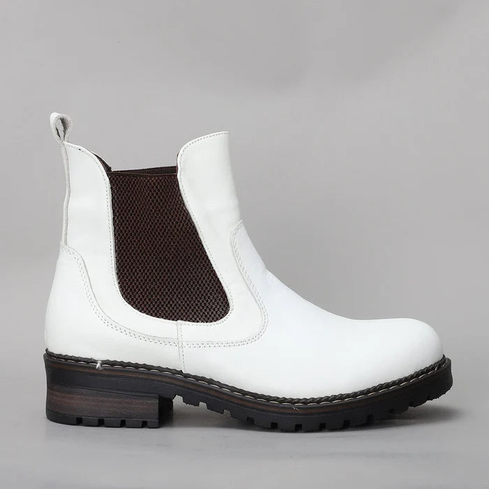 Off-white LE SANSA Rio boots with sleek design and ankle-high style, perfect for casual or chic outfits.