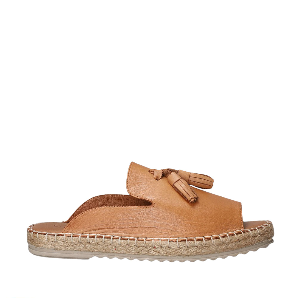 Le Sansa Dolphin Tan flats showing tan slip-on shoes with dolphin detail and comfortable flat sole, perfect for casual wear.
