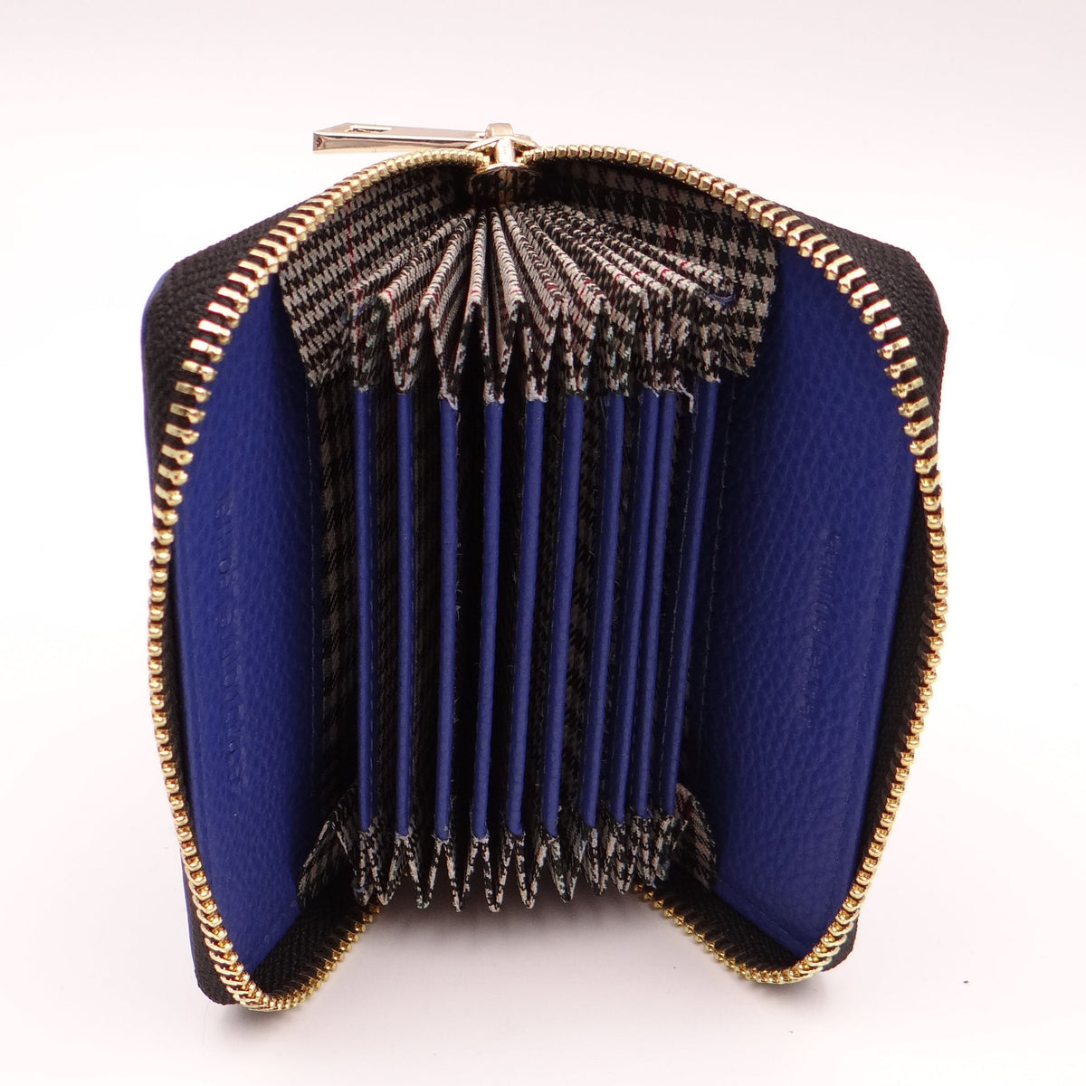Second Nature cobalt wallet with sleek leather design, featuring card slots and secure cash compartment.