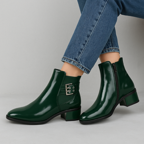 Le Sansa Romy green boots with stylish design, featuring a sleek, vibrant green leather finish and modern silhouette.