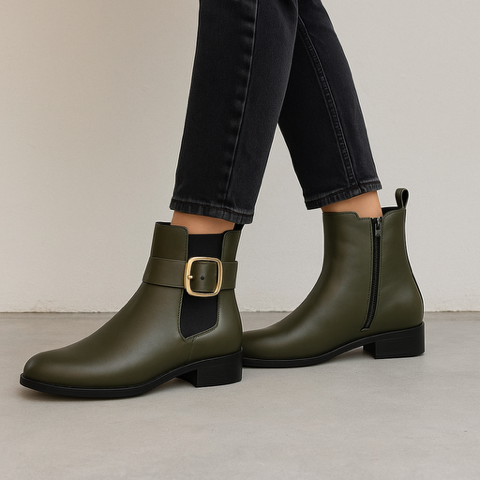 Le Sansa Mister Olive boots displayed on a stand, featuring stylish design and olive green leather material.