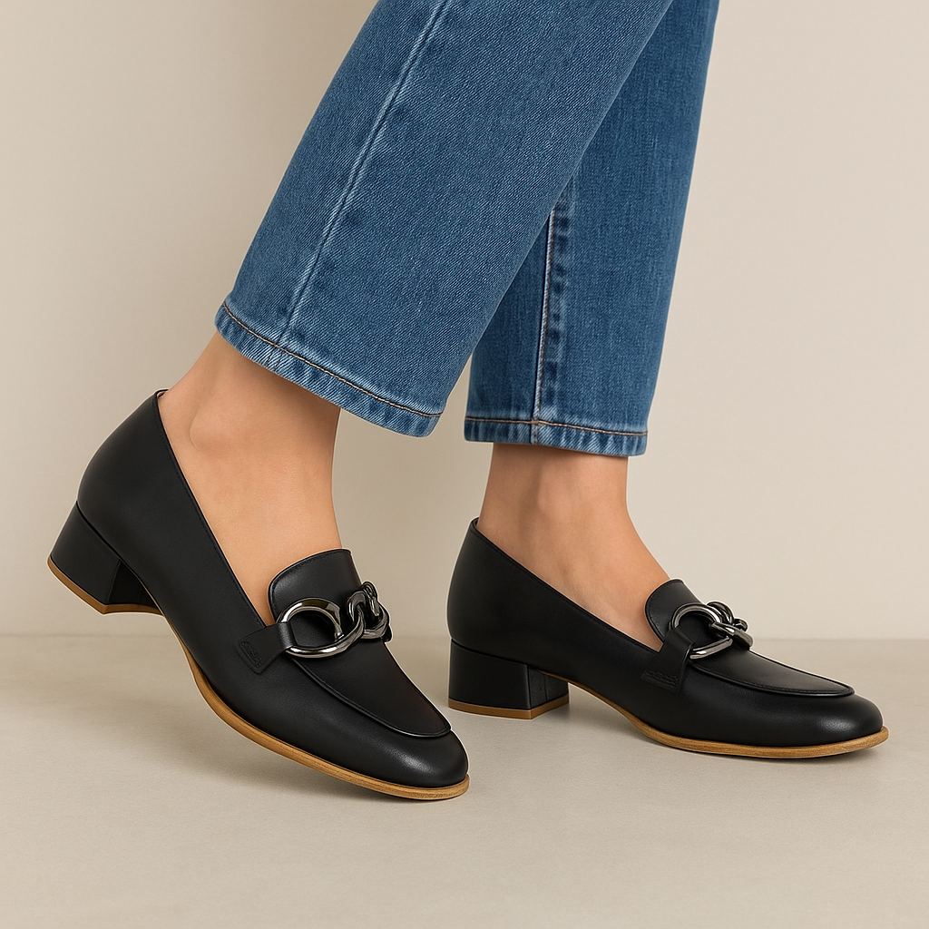 Le Sansa Lesansa Dorset black casual loafers displayed on a white surface with a clean background